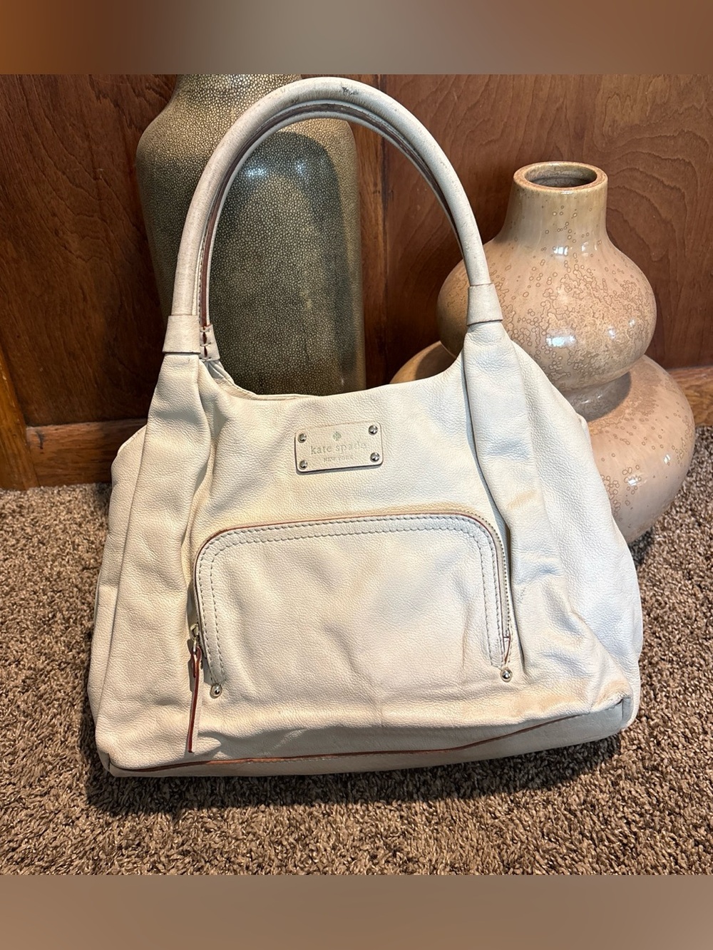 Cream katespade Baxter Street Stevie Bag. Some minor scratches